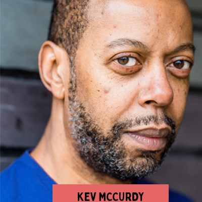 Kev McCurdy headshot with name in centre in front of pink square