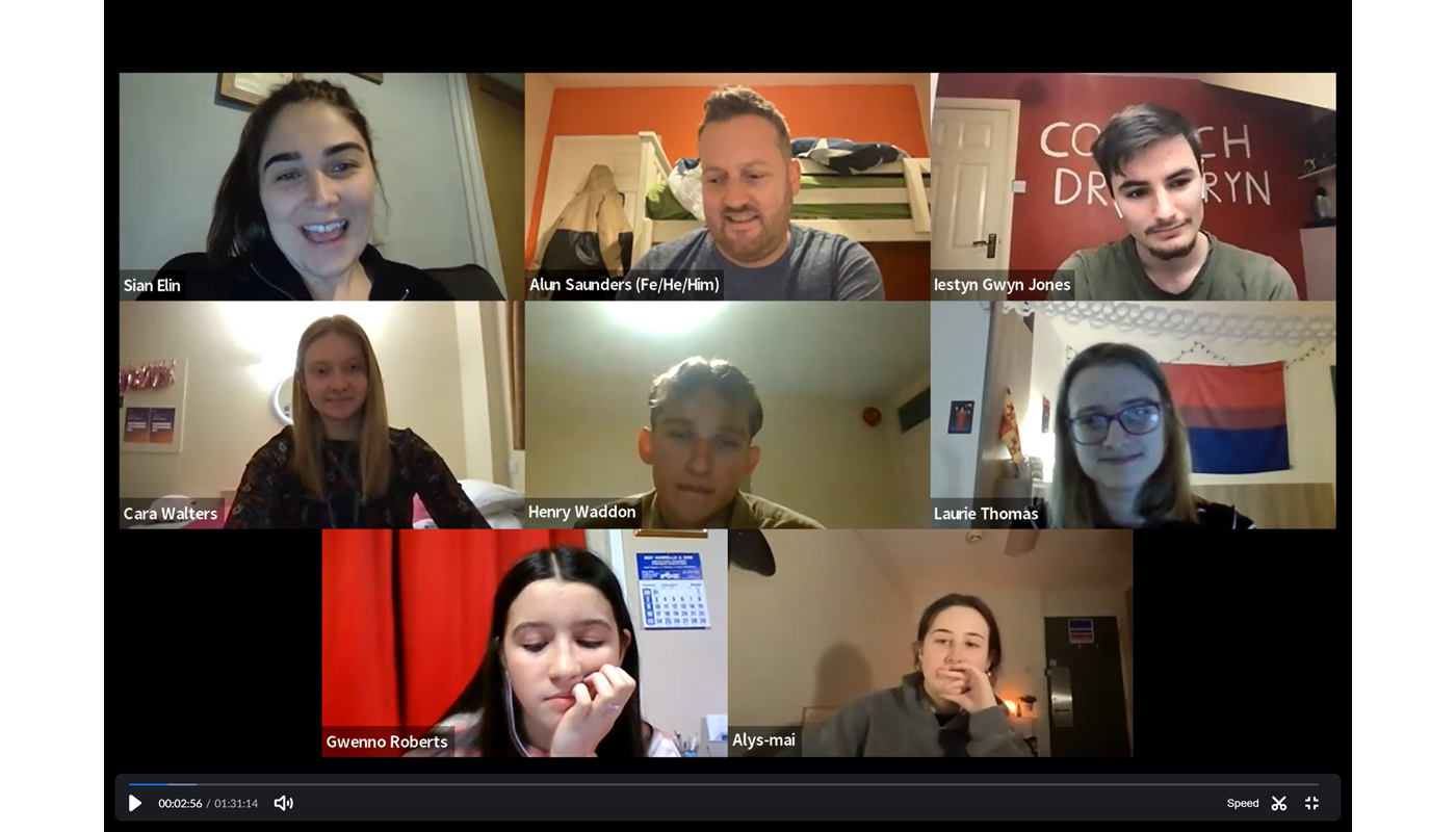 4.	Screenshot of a Zoom call with 9 individuals. Everyone has their camera on, and all participants apart from one are young people. One of the participants is a man older than the rest, he has his mouth open mid-conversation. 